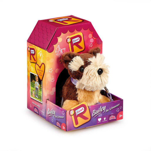 Bailey the Schnauzer plush toy, featuring brown and cream fur, sits in a colorful box with a house design, showcasing a purple collar and heart motifs.