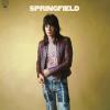 "Springfield (Expanded Edition) album cover features a man with long hair in a burgundy leather jacket and light blue jeans, set against a beige background."