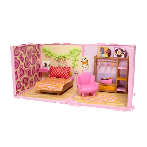 Deluxe bedroom playset features a pink and orange color scheme, a heart-patterned wall, a cozy bed with a patterned blanket, a pink chair, and a stylish wardrobe with accessories.