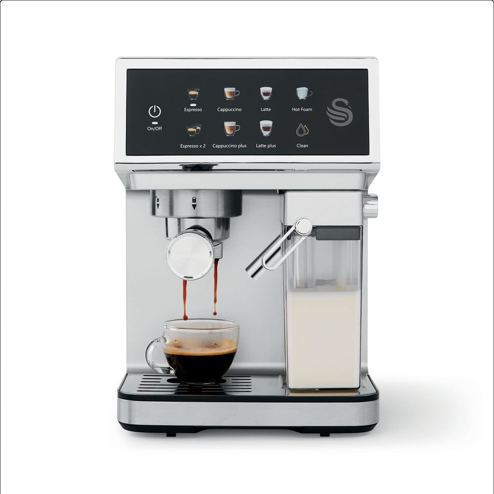 Swan Digital One-Touch Espresso Machine in stainless steel with a sleek black control panel, featuring an automatic milk frother and a glass cup displaying freshly brewed espresso.