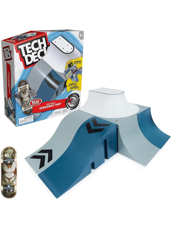 Tech Deck X-Connect Speedway Hop Ramp Set features a blue and gray ramp with smooth curves, designed for finger skateboards, alongside a decorative skateboard.