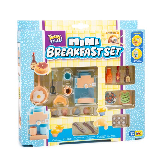 Colorful mini cooking playset featuring a blue and orange stovetop, various food items like pancakes, eggs, and condiments, all packaged in a vibrant, illustrated box.