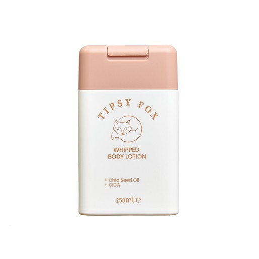 Tipsy Fox Whipped Body Lotion in a 250ml white container with a soft pink cap, featuring a logo of a fox and text highlighting chia seed oil and CICA.
