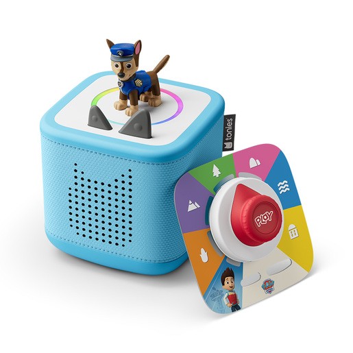 Blue Toniebox with a textured surface, featuring a Paw Patrol character on top, and a colorful, circular control dial with a red play button.
