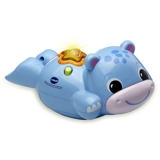 Blue plastic hippo bath toy with a smiling face, pink snout, and a musical button on its back, designed for babies to sing and play during bath time.