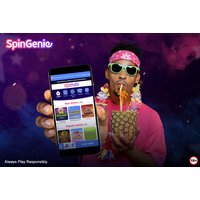 Spin Genie app on smartphone held by person in pink bandana, sipping drink with straw, colorful background.