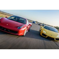 Activities & Experiences Gift Pack featuring red and yellow sports cars on a racetrack, offering UK adventures.