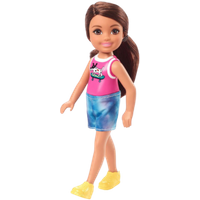 Barbie Chelsea doll with brown hair, pink tank top, blue shorts, and yellow shoes.