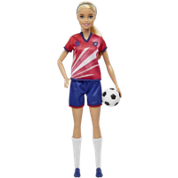 Barbie Soccer Doll in red jersey, blue shorts, white socks, holding a soccer ball, with blonde hair and headband.