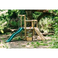 Wooden Plum Discovery Woodland Treehouse with green slide, climbing ladder, and play deck in a forest setting.