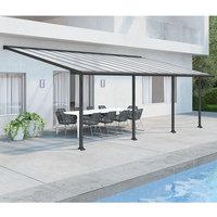 Grey Palram Canopia patio cover with clear panels, supported by black posts, over a patio with outdoor furniture.