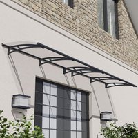 Grey and clear large door canopy with arched design and black frame, mounted above a window on a brick wall.
