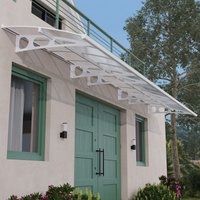 White Palram Canopia Bordeaux door canopy with curved design and clear panels over green double doors.