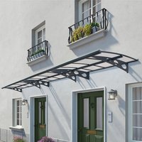 Grey mist large door canopy with arched support beams and clear panels, covering two doors on a white building.