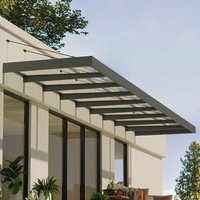 Grey Palram Canopia door canopy with clear panels, sleek metal frame, and modern design extending over patio area.