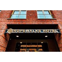 Ropewalks Hotel entrance with brick facade and large black sign featuring gold lettering.