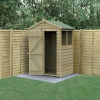Apex wooden shed with overlap panels, single door, and window, pressure treated, set against a wooden fence.