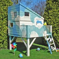 Wooden platform playhouse with blue and white camo design, ladder, and railing, set on a grassy lawn.