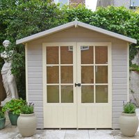 Wooden garden summerhouse with cream double doors, six-pane windows, and a peaked roof, surrounded by greenery.