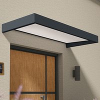 Grey and white door canopy with sleek rectangular design, mounted above a wooden door.