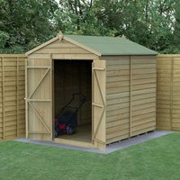 Wooden shed with double doors, apex roof, and no windows, set against a wooden fence on a grassy area.