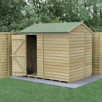 Wooden shed with reverse apex roof, windowless design, pressure-treated overlap panels, and open door on concrete base.