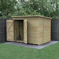 Wooden shiplap shed, 8'x6', pressure treated, windowless, double doors open, set on concrete slab, surrounded by fencing.