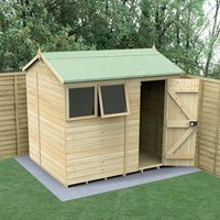 Wooden reverse apex shed with green roof, two windows, and open door, set on a concrete base in a fenced garden.