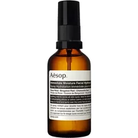 Aesop brown glass bottle with black spray nozzle, labeled "Immediate Moisture Facial Hydrosol 60 ml" for all skin types.