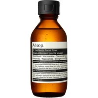 Amber bottle of Aesop In Two Minds Facial Toner, black cap, white label with text, 100 ml size.