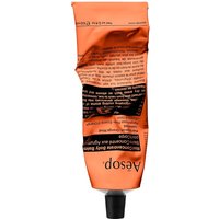 Aesop Rind Concentrate Body Balm in orange tube with black text, 100 ml, black cap, crinkled texture.