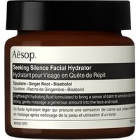 Brown jar with black lid, Aesop label, "Seeking Silence Facial Hydrator" text, 60 ml, for sensitive skin.