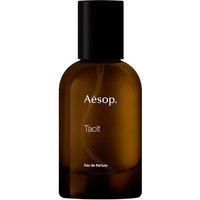 Aesop Tacit Eau de Parfum 50 ml bottle, amber glass with black cap, white text label, unisex woody fragrance.