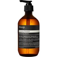 Amber bottle with black pump, labeled "Aesop Volumising Shampoo" for normal, thin, delicate hair, 500 ml.