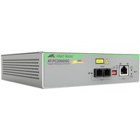 Gray Allied Telesis network media converter with ports, LED indicators, and model AT-PC2000/SC-960 label on the front.