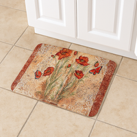Anti-Fatigue Mat by Avilo, beige with red poppy flowers and butterfly design, placed on tiled floor.
