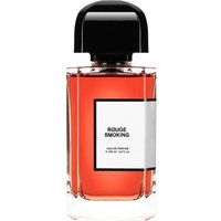 Clear glass bottle of Bdk Rouge Smoking Eau de Parfum, black cap, white label, red liquid, 100 ml size.