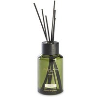 Green Christian Tortu Forets aromatic diffuser with black reeds and a sleek, cylindrical bottle design.