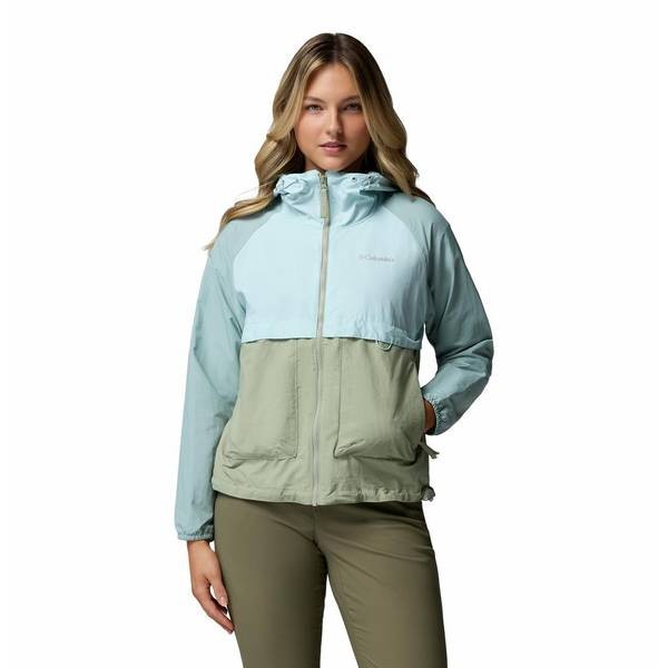 Light green Columbia women's softshell jacket featuring a zip front, hood, and two front pockets, made from a water-resistant material.