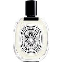 Clear oval bottle of Diptyque Eau des Sens Eau de Toilette with black cap and intricate label design.