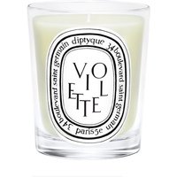 Diptyque Violette floral candle in clear glass with black and white oval label design.