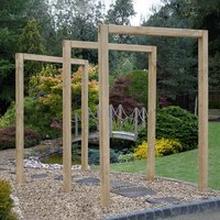 Wooden garden arch set with three rectangular frames, natural finish, standing on gravel path in a landscaped garden.