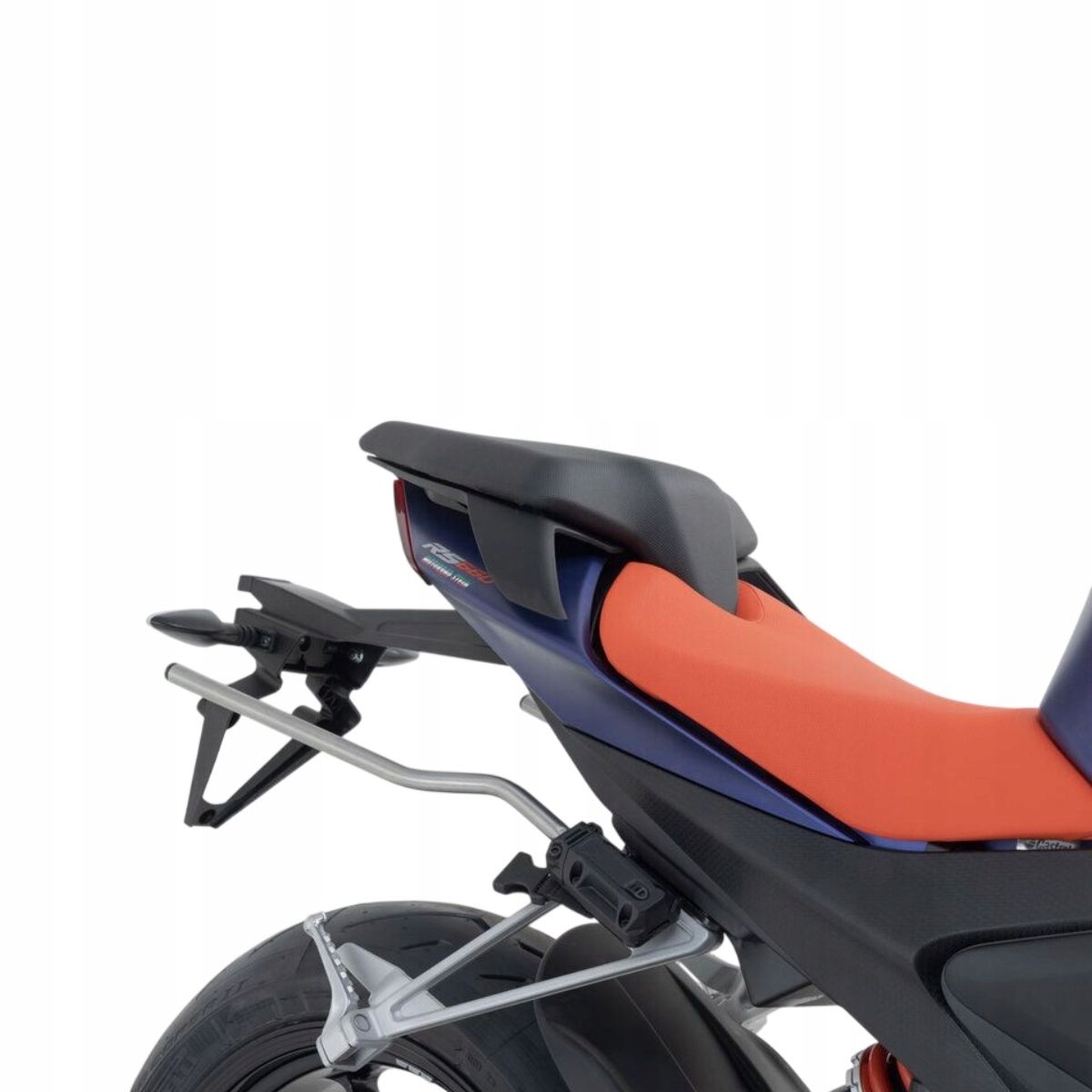 Black spacer bars designed for SW-Motech BLAZE panniers, mounted on a BMW R 1300 R motorcycle, featuring a sleek design and sturdy metal construction.