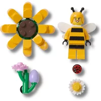 Jibbitz 5 pack for Crocs featuring a bee, sunflower, ladybug, daisy, and purple flower with green stem.