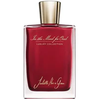 Red rectangular perfume bottle with gold cap, labeled "In the Mood for Oud" by Juliette has a Gun, 75 ml.