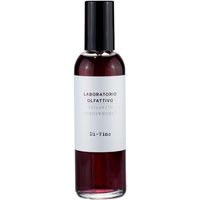 Dark amber bottle of Laboratorio Olfattivo Di-Vino fruity room spray with black cap and white label.