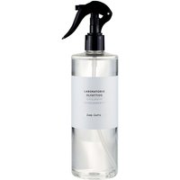 Clear bottle of Zen-Zero spicy room spray with black trigger nozzle and white label by Laboratorio Olfattivo, 500 ml.