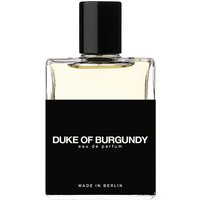 Clear glass bottle with black cap, labeled "Duke Of Burgundy Eau de Parfum" in white text on black label.