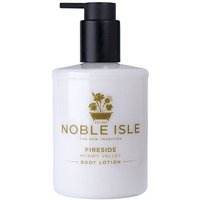 White Noble Isle Fireside Body Lotion bottle with black pump and gold floral logo, 250 ml size.