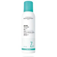 White Novexpert Brume Trio-Zinc spray bottle with turquoise cap, 150 ml, labeled for all skin types.